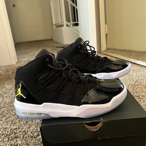 brand new Jordan Max Aura.  size 8.   Black/university- gold white..